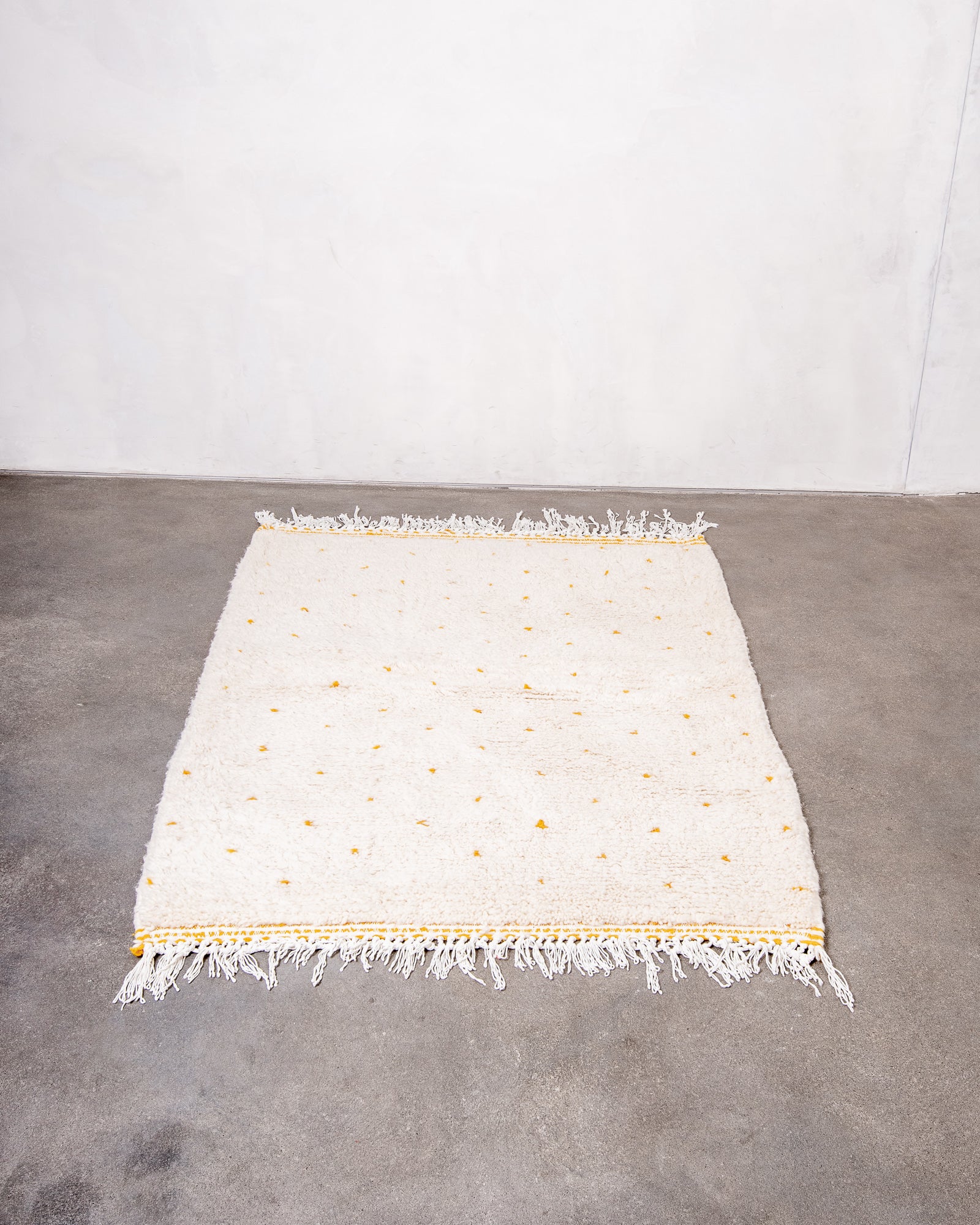 Modern, designer, handcrafted Berber rug from Morocco. Beniourain carpet with beautiful colours and patterns and fluffy wool texture.